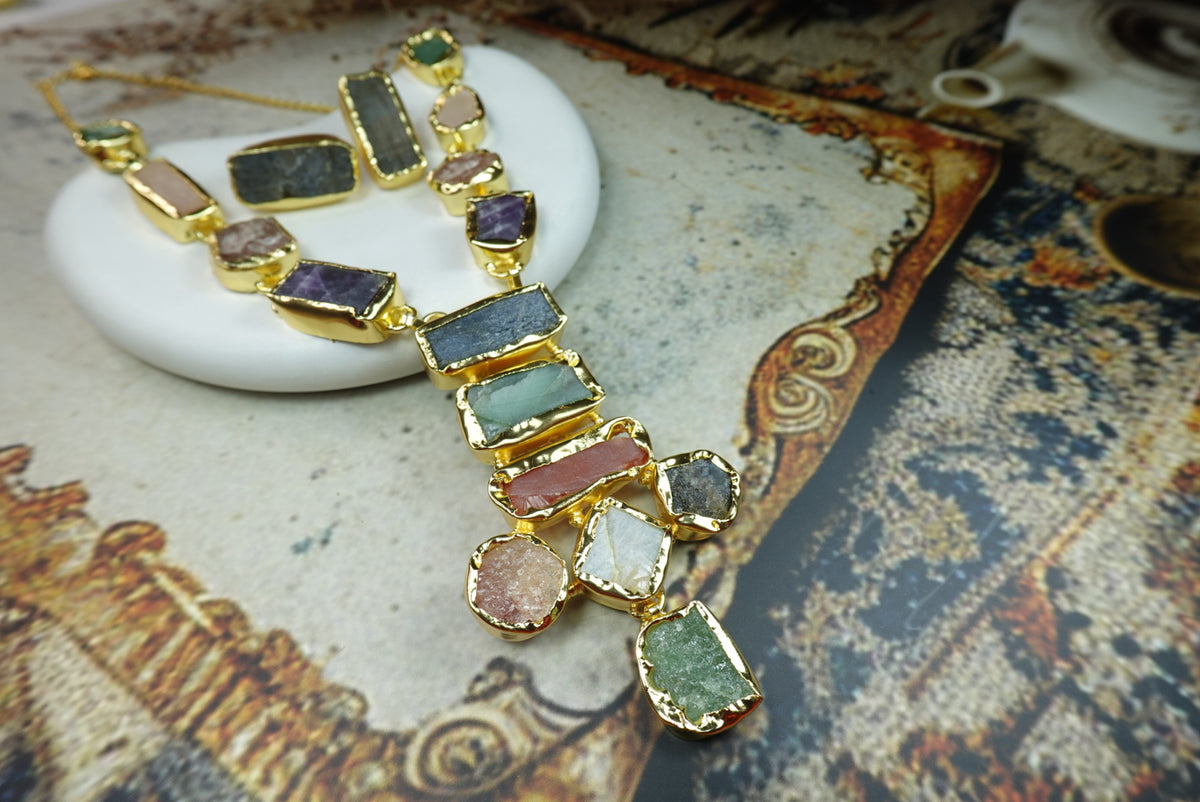 Raw multi-gemstone statement necklace and earrings set in 18K gold plating