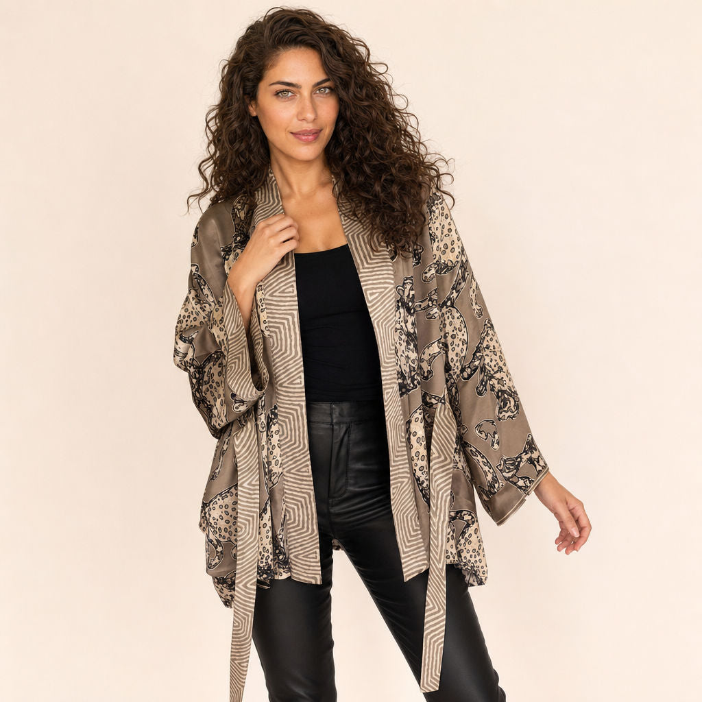 Leopard Print Satin Kimono — Untamed Earth satin fabric in motion showing fluid drape