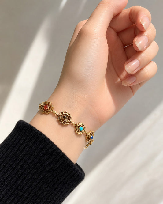 Seven chakra sacred geometry charm bracelet with gemstone beads in silver and gold