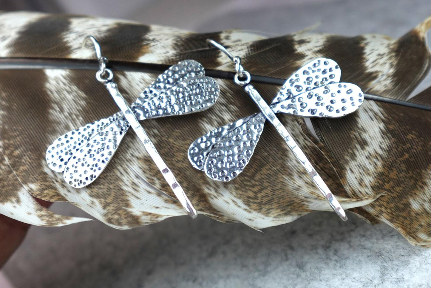 Textured Brass Dragonfly Earrings - Nature-inspired dangle earrings with hammered dragonfly motifs in antique brass.