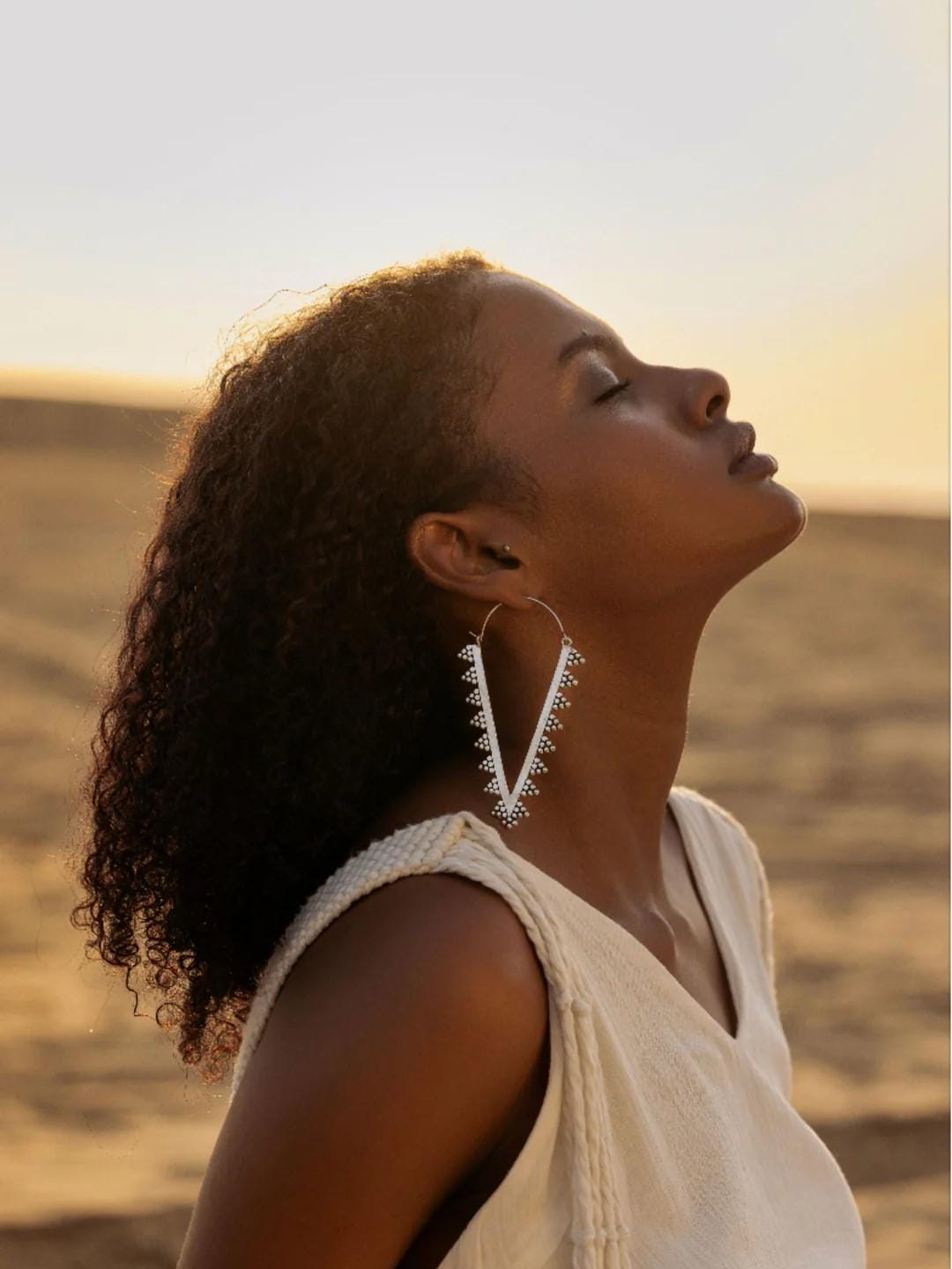 Zahara Spike Hoops - Edgy Brass Triangle Hoops with Boho Desert Vibes.