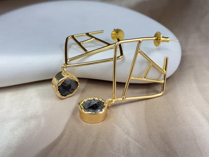 Geometric Gold Drop Earring with Faceted Gemstone.