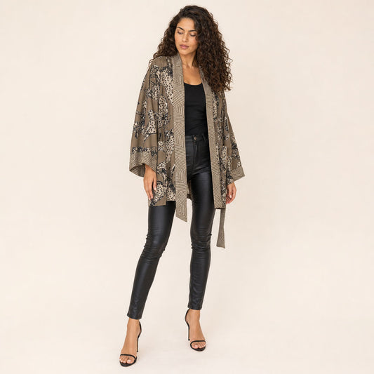 Leopard Print Satin Kimono — Untamed Earth three-quarter view showing drape and layering