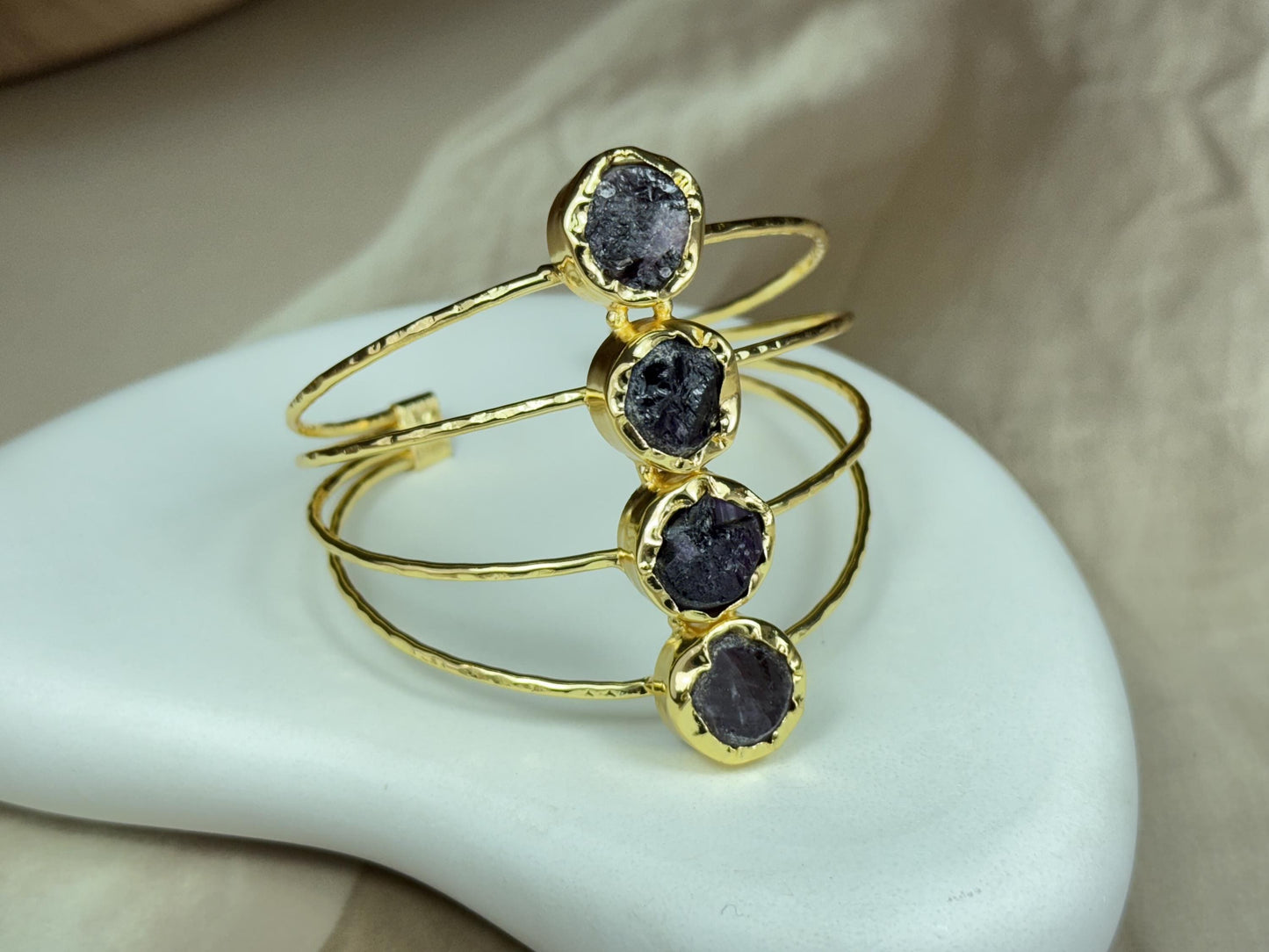 18K gold-plated pieces is handcrafted adjustable cuff.