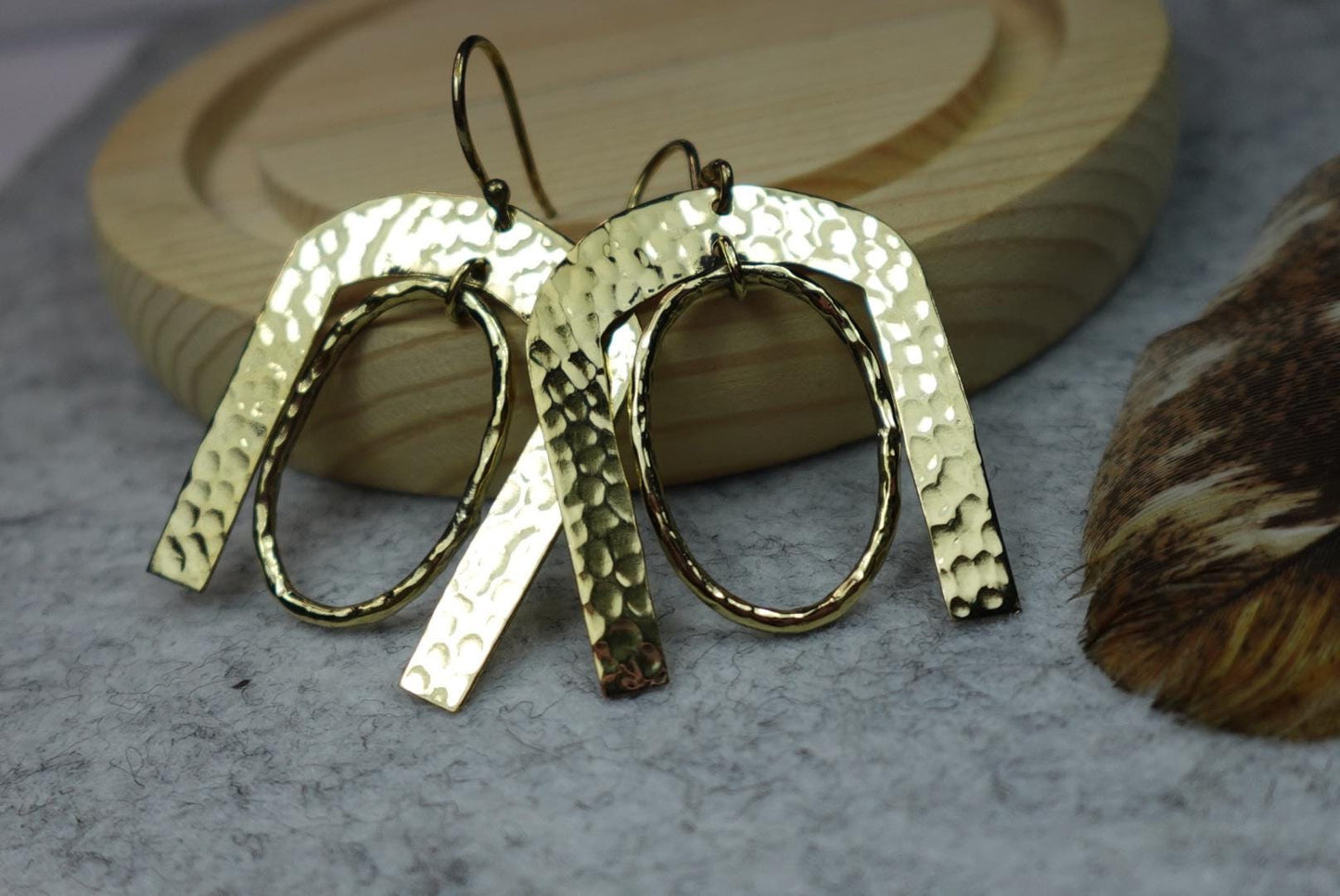 Hammered Horseshoe Brass Earrings - Statement earrings with a bold arch and hammered finish in gold-tone brass.
