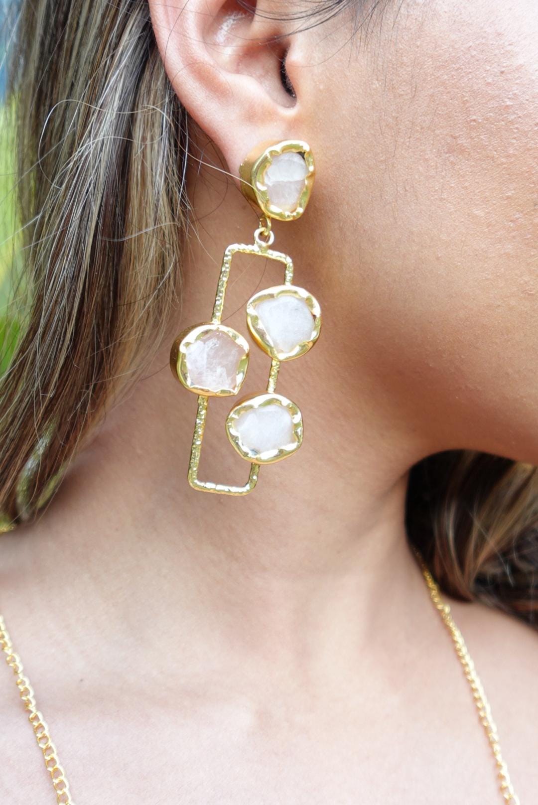 Handcrafted Long Rose Quartz Dangle Earrings with Raw Gemstones Set in Textured Gold-Plated Frames.