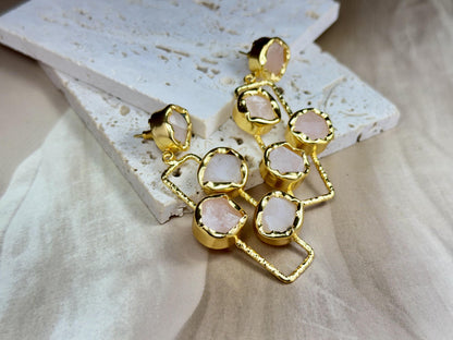 Handcrafted Long Rose Quartz Dangle Earrings with Raw Gemstones Set in Textured Gold-Plated Frames.