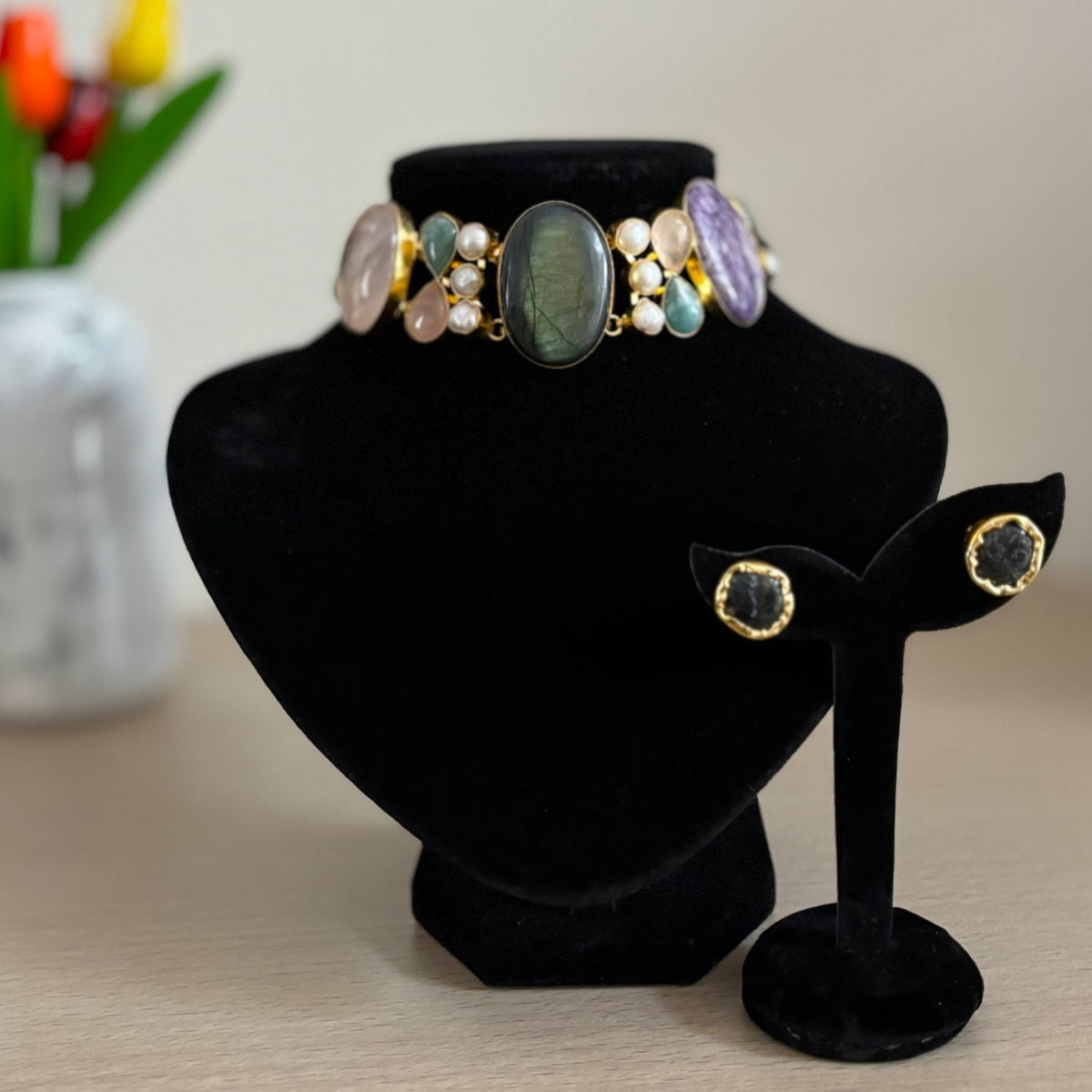 Close-up of the labradorite centre and raw stone studs on the Garden of Dusk natural stone choker set
