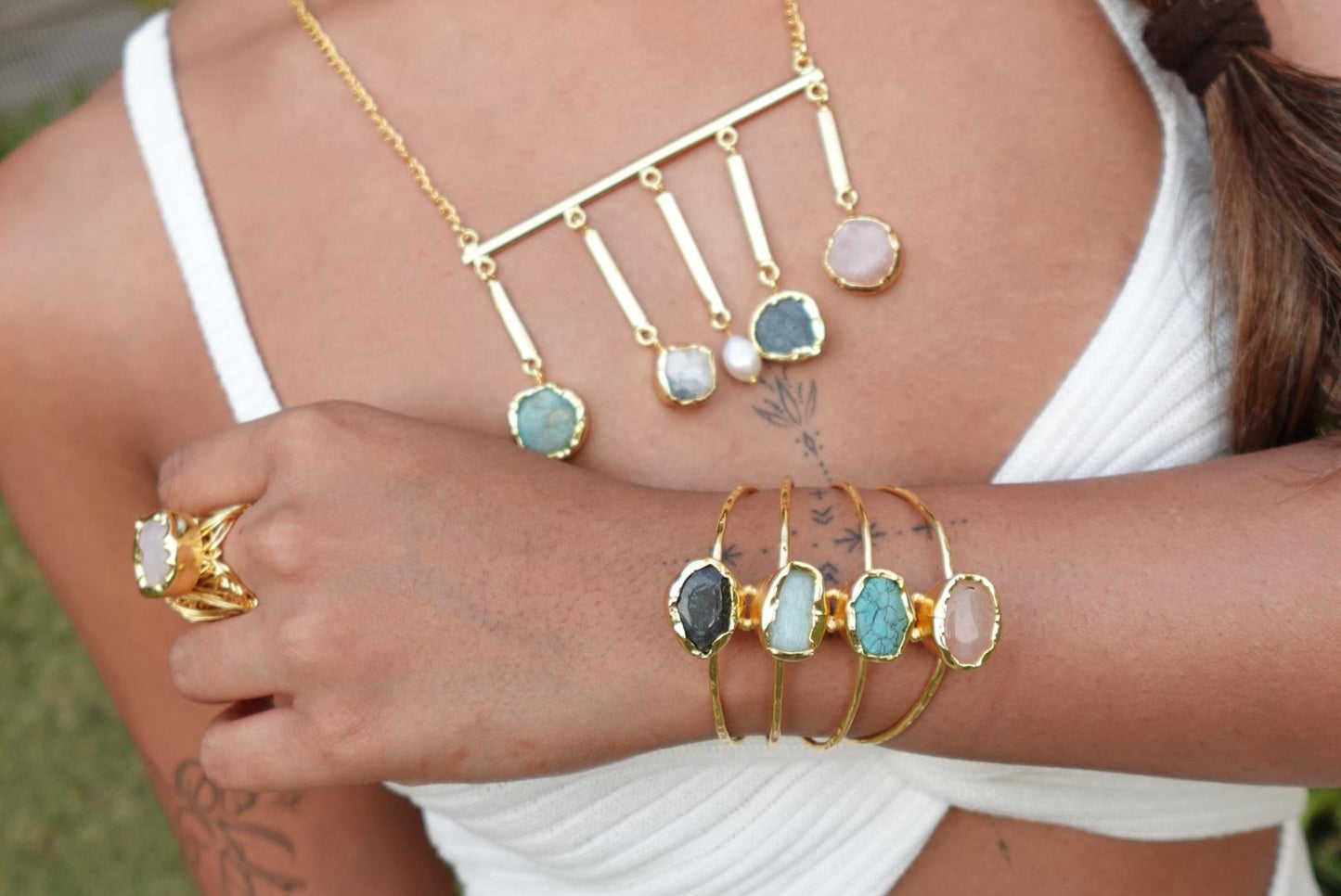 Bohemian Charm Necklace – Raw Natural Stones Drops on Gold Bar with Natural Pearl Accent.