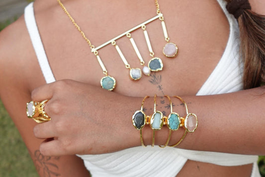 Bohemian Charm Necklace – Raw Natural Stones Drops on Gold Bar with Natural Pearl Accent.