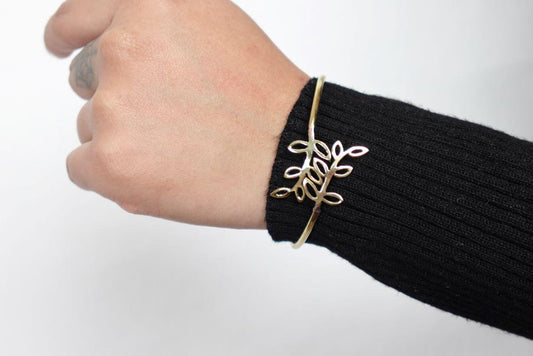 Leaf Motif Brass Adjustable Bracelet - Open cuff bracelet with a delicate leaf design—lightweight and nature-inspired.
