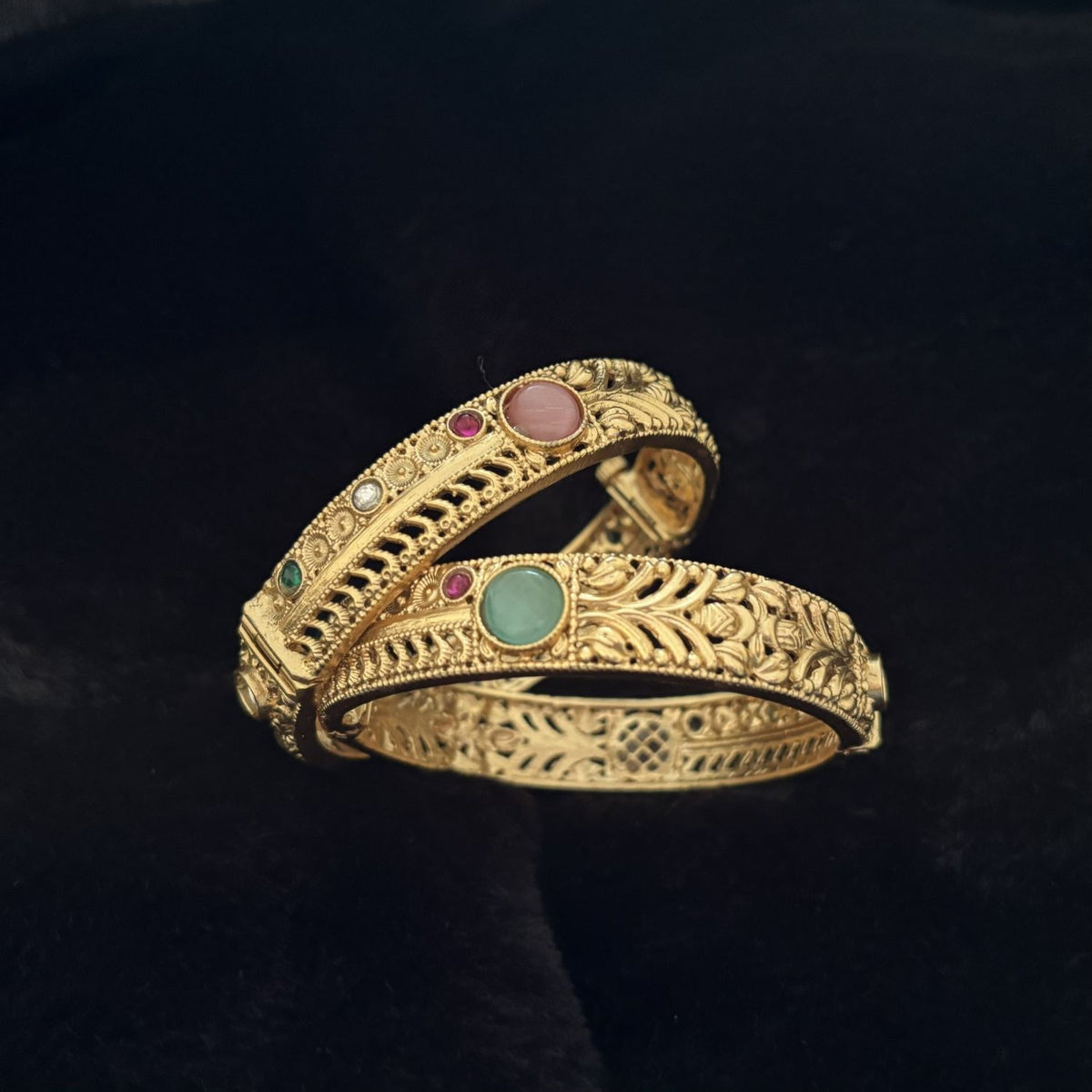 Two-Way Brass Kada Bangle — Twin Dawn showing its shimmering pink and mint faces, gold-polished brass by Boho Mantra