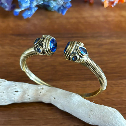 Adjustable Brass Cuff Bangle — Temple Twilight in Ink Blue — faceted glass set in jewelled brass terminals