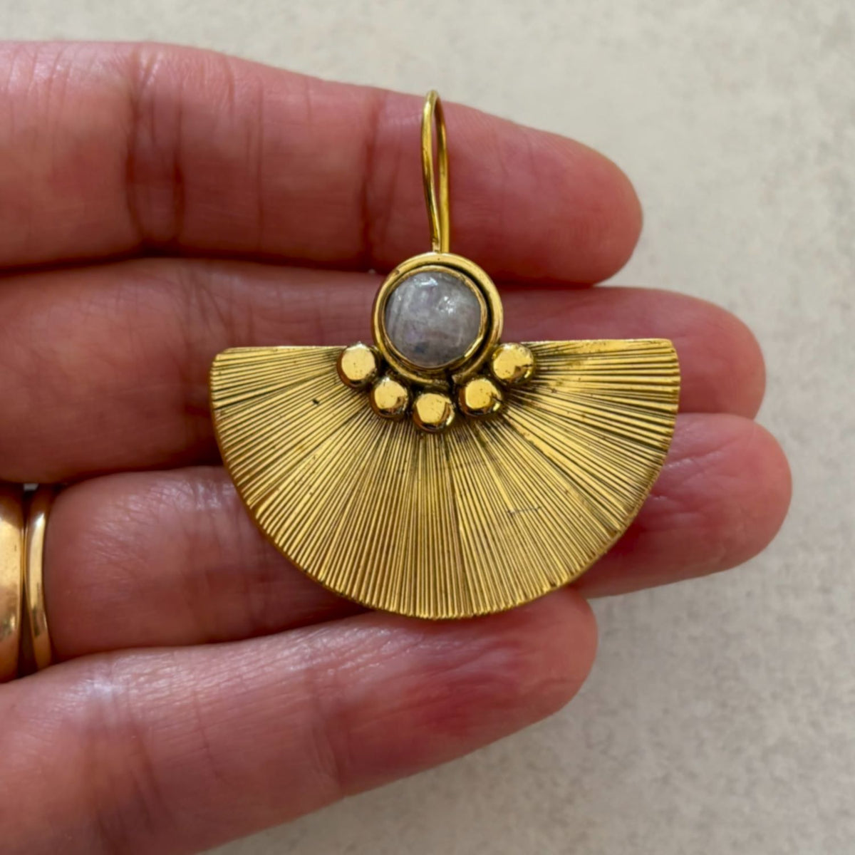 Gold-Plated Sunray Fan Earrings — Solstice with milky moonstone cabochon and sunray-etched gold fan