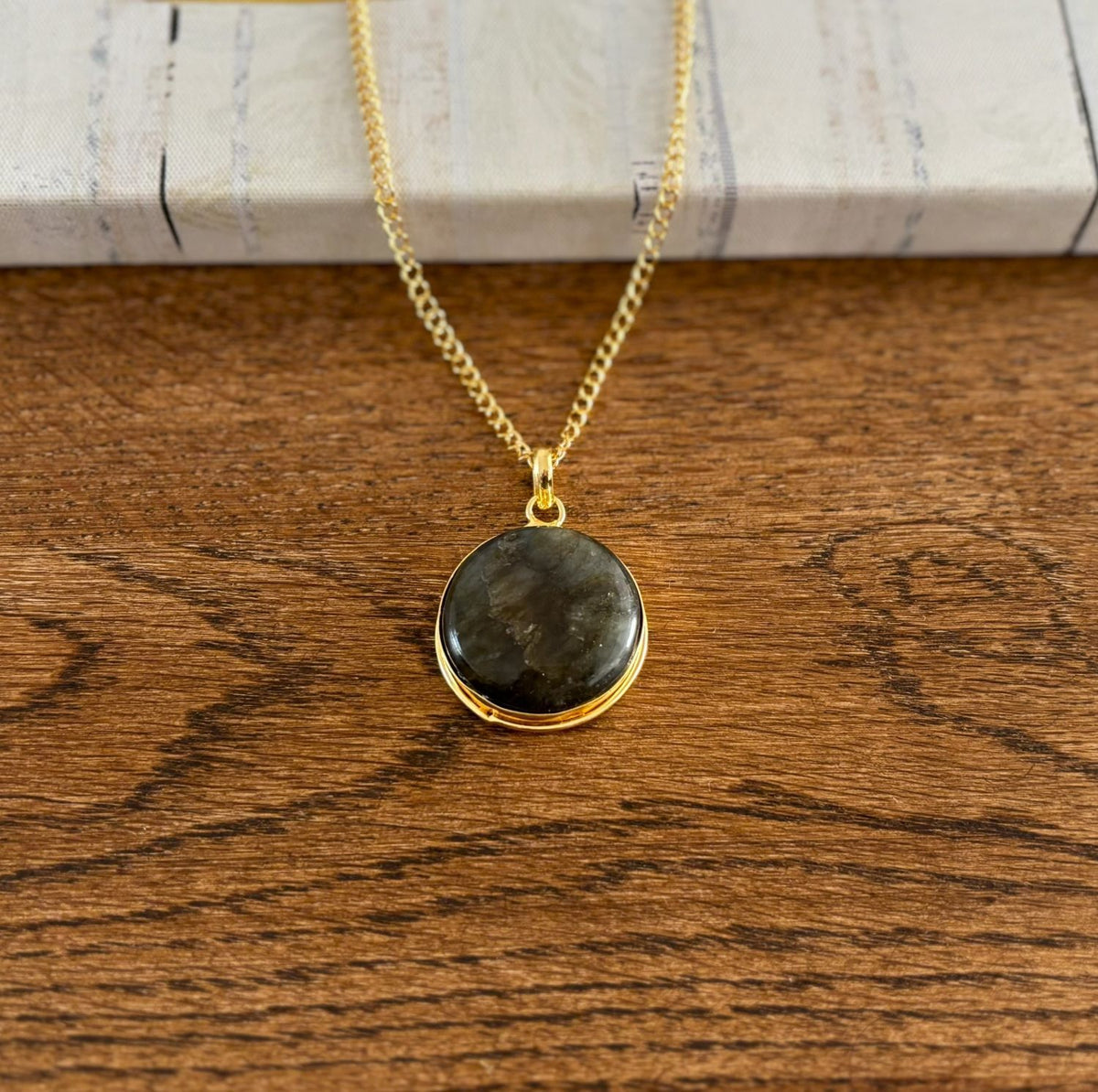Round labradorite pendant necklace in 18k gold-plated brass with a stepped bezel