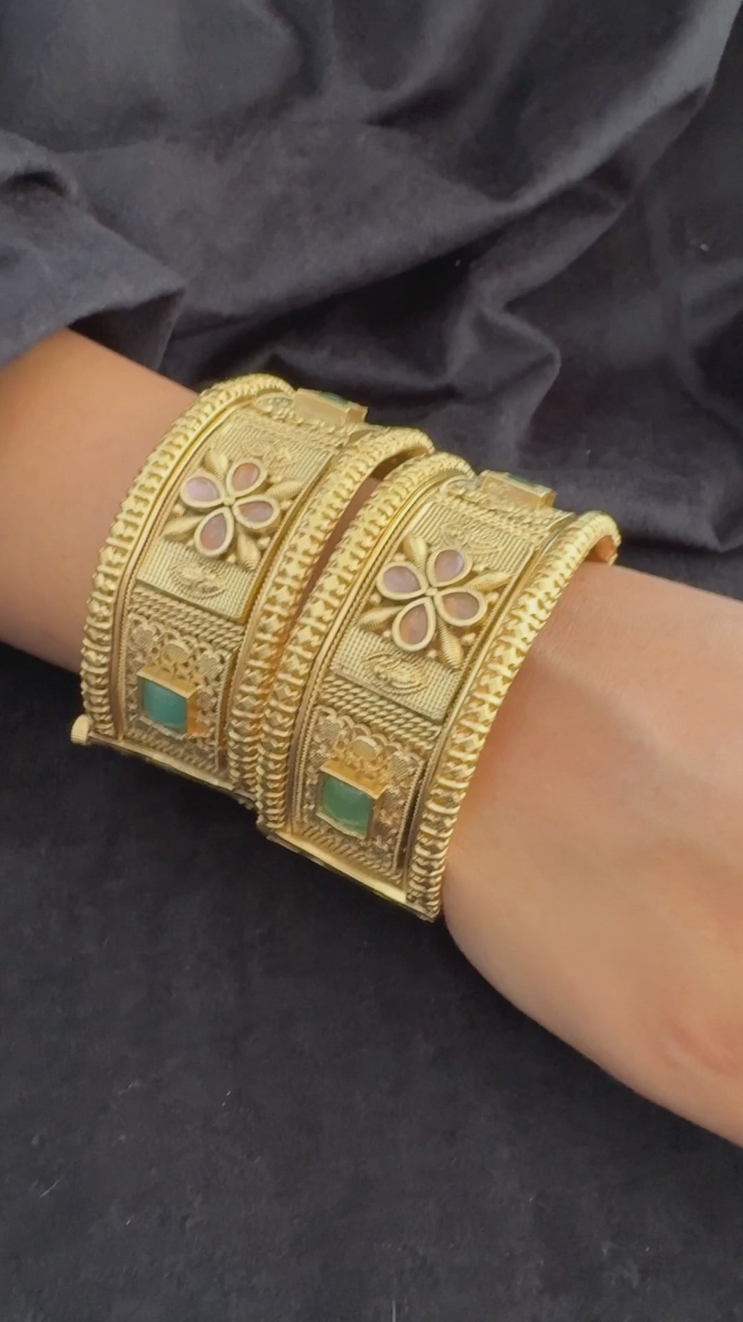 Emerald Bloom Rajwadi Kada - Gold polished bridal kada with floral pastel petal motifs and green square stones in embossed temple styling..