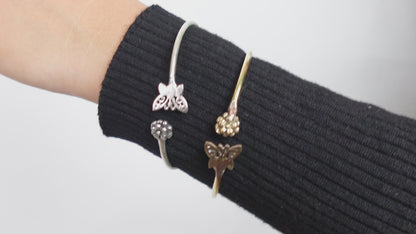 Whimsical Butterfly Open Bangles - Adjustable bangles featuring butterfly and flower motifs in brass and silver.