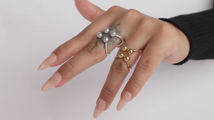Modern Orb Cluster Rings – Minimalist Gold and Silver Statement Design.