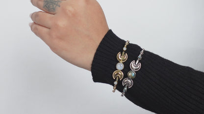 Double Moonstone Lunar Cuff Bracelet - Brass and silver cuffs with crescent moons and moonstones—mystical and chic.